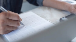 HR professional reviewing employee benefits strategy and cost trends during Q2 planning