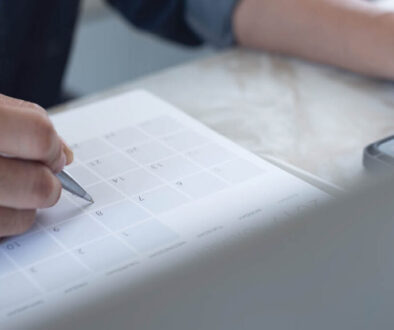 HR professional reviewing employee benefits strategy and cost trends during Q2 planning